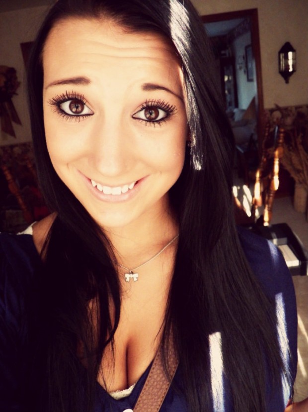 I'm in love with my eyes, but my smile, I wish I could change it. I almost have vampire teeth. 
